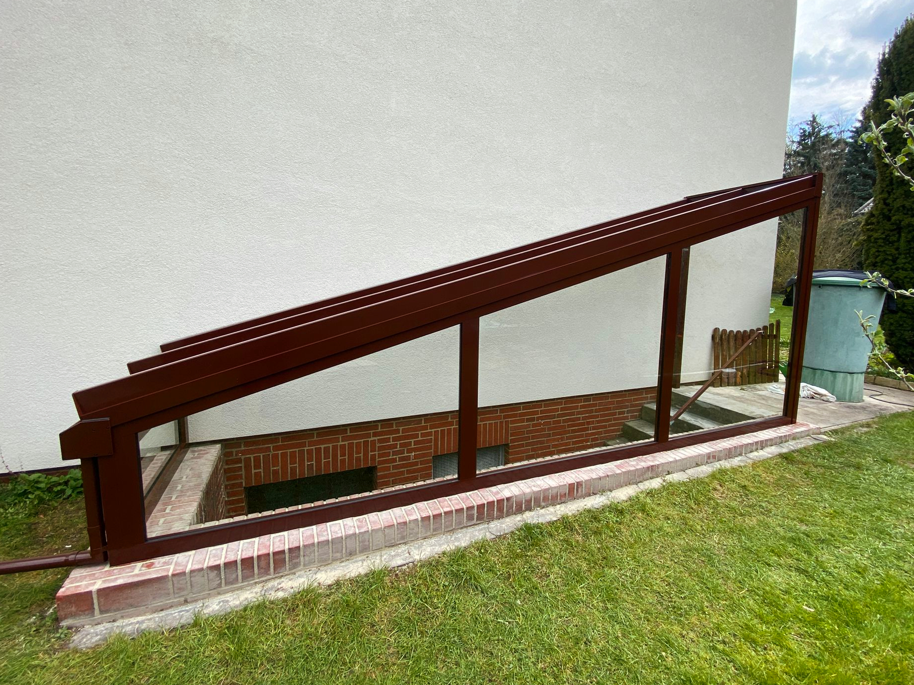 Kellertreppenüberdachung auf Terrassendach-Basis in Königslutter